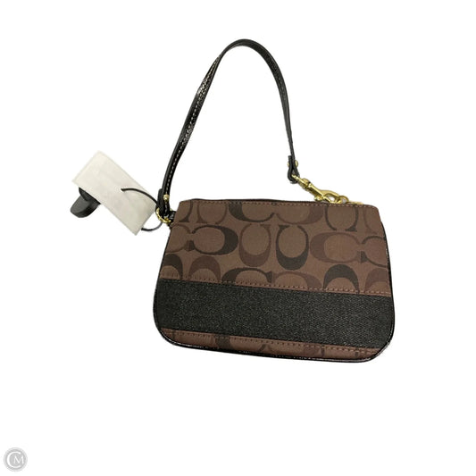 Wristlet Designer By Coach, Size: Medium